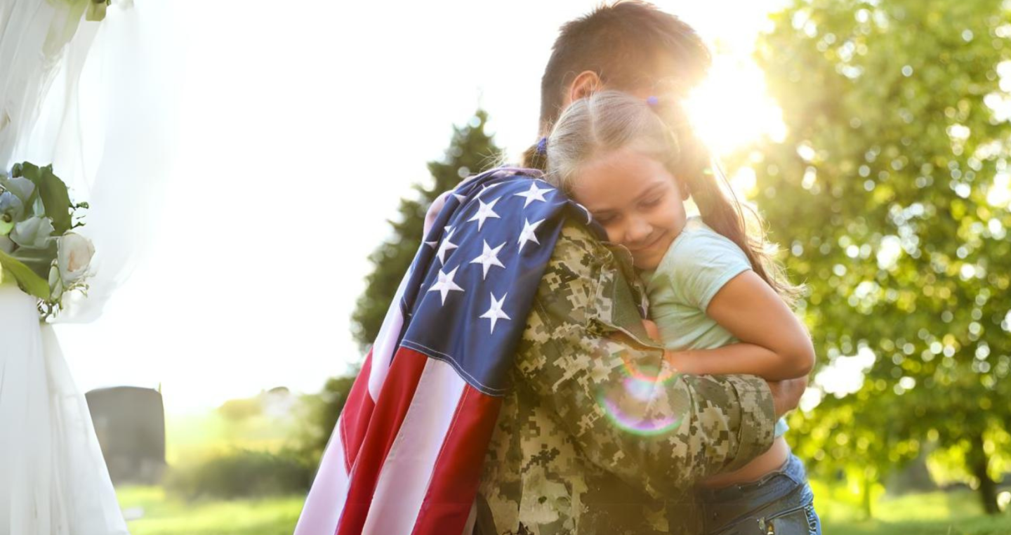 Troop home, dad hug